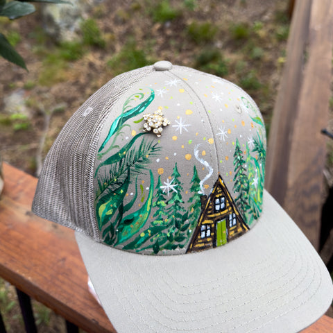 "Hideaway A-Frame in the Woods"  Gray Hand Painted Trucker Hat