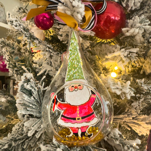 "Santa with a Christmas Tree Hat" Snow Globe Christmas Ornament